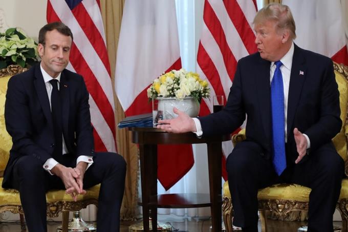 Pháp, EU phản ứng trước lời đe dọa đánh thuế của Mỹ