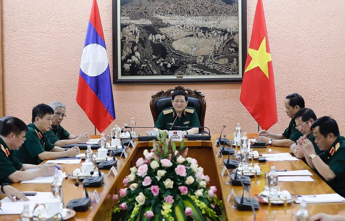 Việt Nam và Lào thúc đẩy hiệu quả hợp tác quốc phòng